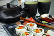 traditional japanese sushi meal with green tea