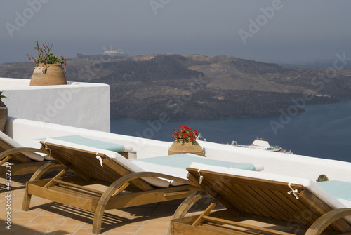 luxury villa view of greek island harbor  