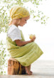 child with apple