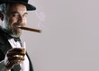 Foto: man with glass and cigar man with glass and cigar