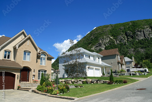 New houses in a rich suburban neighborhood New houses in a rich suburban neighborhood
