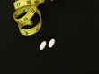 Photo: supplements with a tape measure supplements with a tape measure