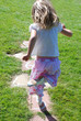 Girl playing hopscotch