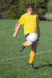 Youth Teen Soccer Player Kneeing Ball Youth Teen Soccer Player Kneeing Ball