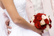 bride with bouquet red and rose flowers bride with bouquet red and rose flowers