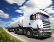 Photo: truck driving on country-road/motion truck driving on country-road/motion