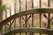 photo of a fence spikes photo of a fence spikes