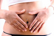 Bauch mit Händen