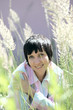 Portrait of the girl among a grass