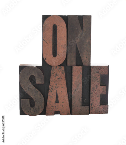 Photo: 'on sale' in old wood letters 'on sale' in old wood letters
