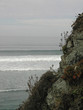 Looking out over the waves from a rocky shore Looking out over the waves from a rocky shore