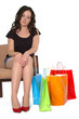Beautiful girl after a long shopping day Beautiful girl after a long shopping day
