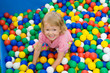 girl with varicoloured balls
