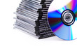 Stack of CD boxes with blue CD isolated