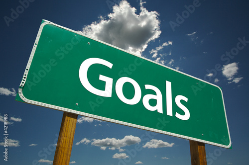 Photo: Goals Road Sign with blue sky and clouds. Goals Road Sign with blue sky and clouds.