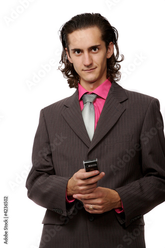 Photo: businessman with a mobile phone in hand. on white businessman with a mobile phone in hand. on white