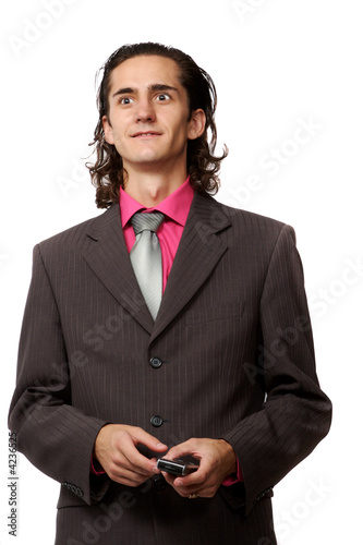 Photo: businessman with a mobile phone in hand. on white businessman with a mobile phone in hand. on white