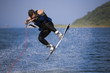 jumping wakeboarder in water splash jumping wakeboarder in water splash