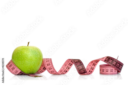 Photo: Apple and measuring tape Apple and measuring tape