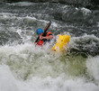 Man Paddling his Kayak on Whitewater Rapids