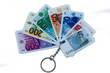 Keyring with euro notes, isolated on white background