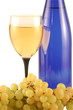 Bottle of wine, glass and grapes isolated on white . Bottle of wine, glass and grapes isolated on white .