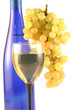 Bottle of wine, glass and grapes isolated on white . Bottle of wine, glass and grapes isolated on white .