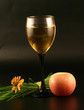 Glass of wine, apple and grass on a black background. Glass of wine, apple and grass on a black background.