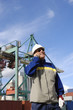 engineer with commercial port in background
