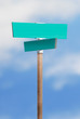 Blank street sign on blue sky Blank street sign on blue sky