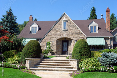House with dormers and large stone gable