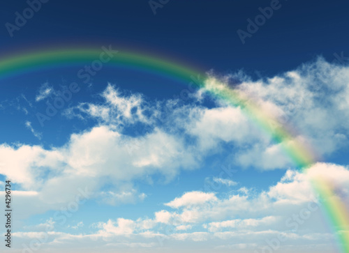 rainbow between the clouds