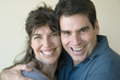Man and woman holding each other