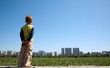boy looking at the town