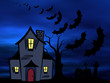 Halloween theme: Bats flying over the old house and cemetery