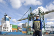 engineer and busy commercial container ship