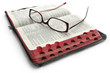 Open Bible with Glasses