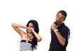Young hispanic teen couple singing - isolated