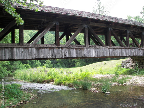 Photo: Amish handmade wooden bridge over a creek. Amish handmade wooden bridge over a creek.