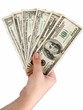 Female hand with dollars