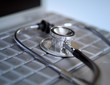 Stethoscope on a laptop keyboard 