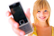 Young girl holding out phone