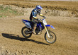Photo: Rider flying over land Rider flying over land