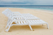 Four chaise-longue on the beach of Ocean.