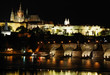 Prague at night with reflection on the water