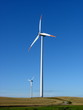 Wind turbine on a hilly field
