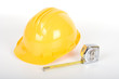 Safety gear and measure tape - over a white background