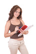 Beautiful young female student reading a book