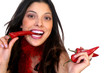 Beautiful Latina Eating Chilis