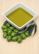 Extra virgin olive oil in a square bowl